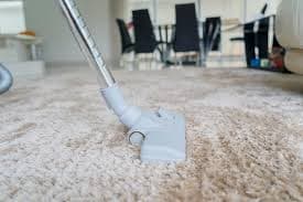 Why is vacuuming not a replacement for professional carpet cleaning?